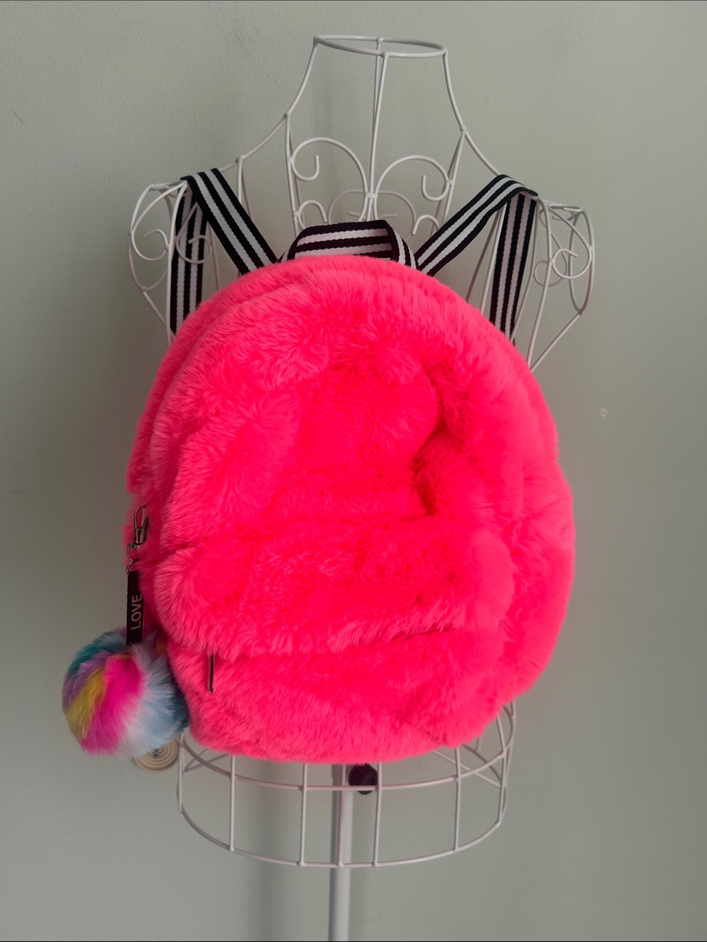 Claire's Bright Neon Pink Fuzzy Kids Backpack with Rainbow Pom
